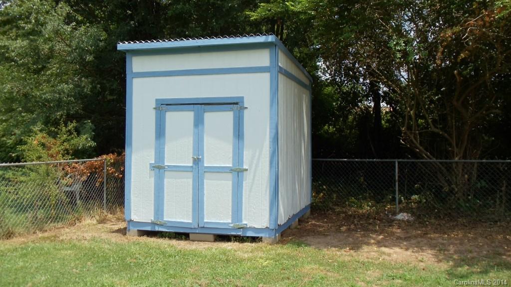 1766 North Ingleside Farm Road Iron Station, NC 28080 - Photo 23 of 23 a view of backyard with tub