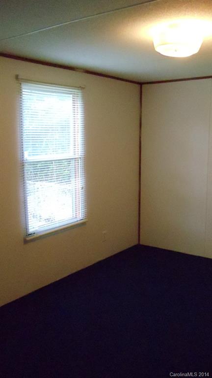1766 North Ingleside Farm Road Iron Station, NC 28080 - Photo 7 of 23 an empty room with a window