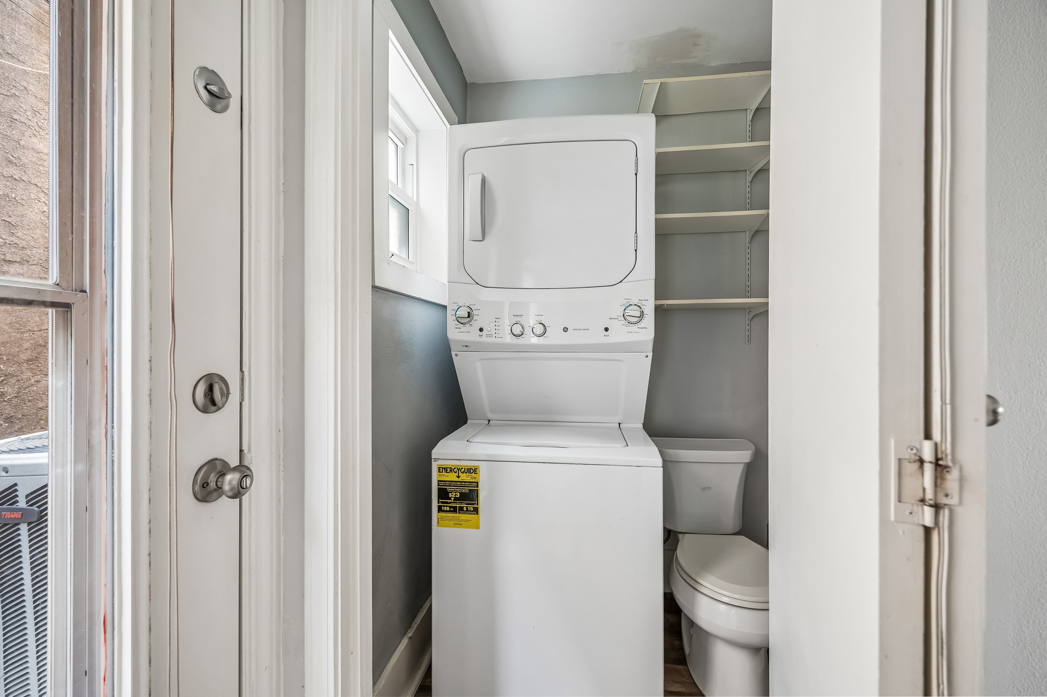 1205 Autrey Street, Unit 4 Houston, TX 77006 - Photo 10 of 11 Downstairs 1/2 bathroom and stack washer and dryer.