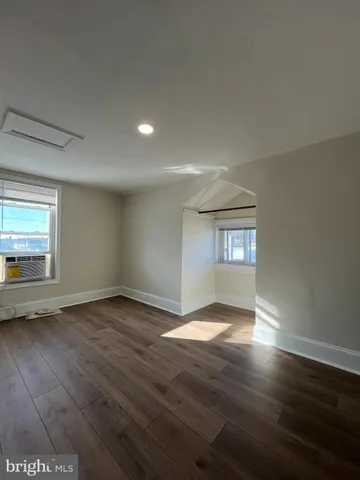a view of an empty room and window