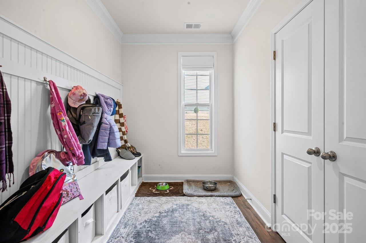313 Streamwood Road Troutman, NC 28166 - Photo 24 of 48 a view of a room with gym equipment