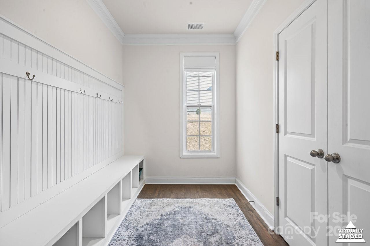 313 Streamwood Road Troutman, NC 28166 - Photo 25 of 48 a hallway with windows