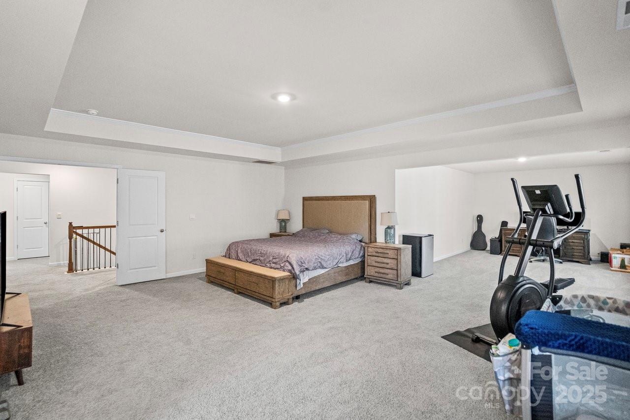 313 Streamwood Road Troutman, NC 28166 - Photo 36 of 48 a bedroom with furniture and a window