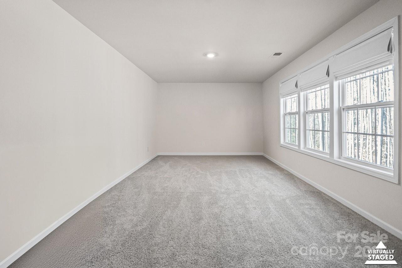 313 Streamwood Road Troutman, NC 28166 - Photo 38 of 48 an empty room with a windows