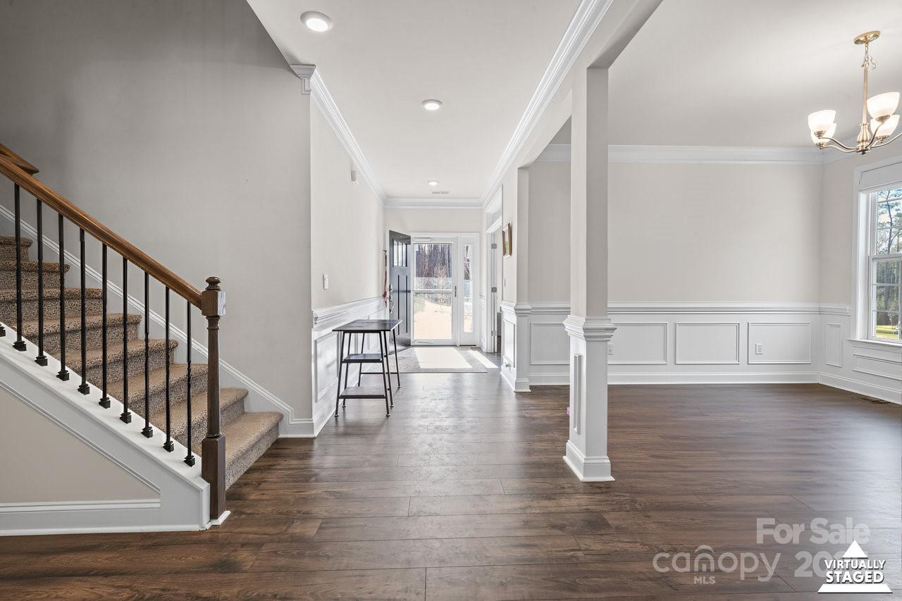 313 Streamwood Road Troutman, NC 28166 - Photo 5 of 48 a view of empty room with wooden floor