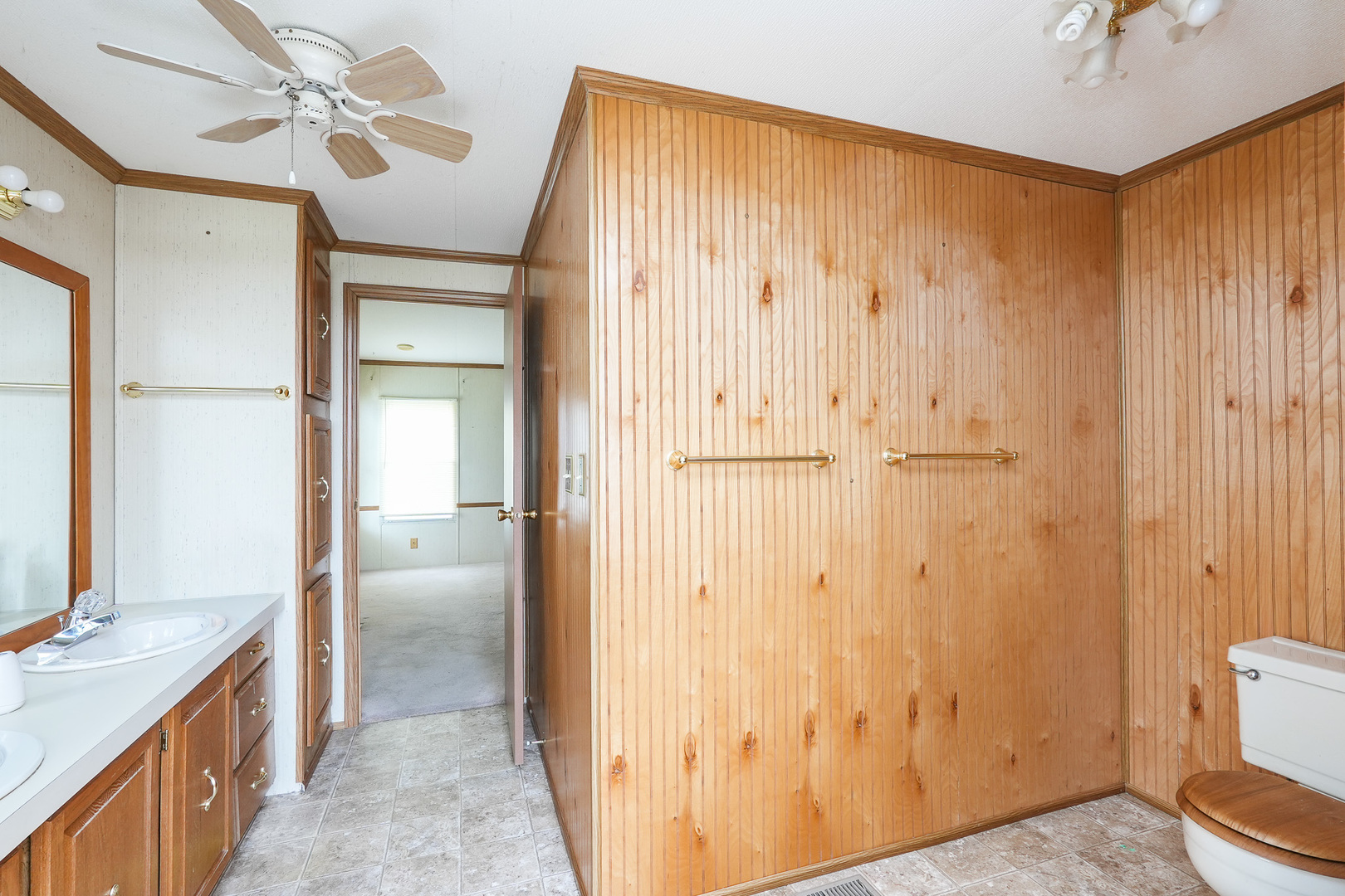 59 Maple Lane Manteno, IL 60950 - Photo 19 of 26 a view of a hallway with a chandelier fan