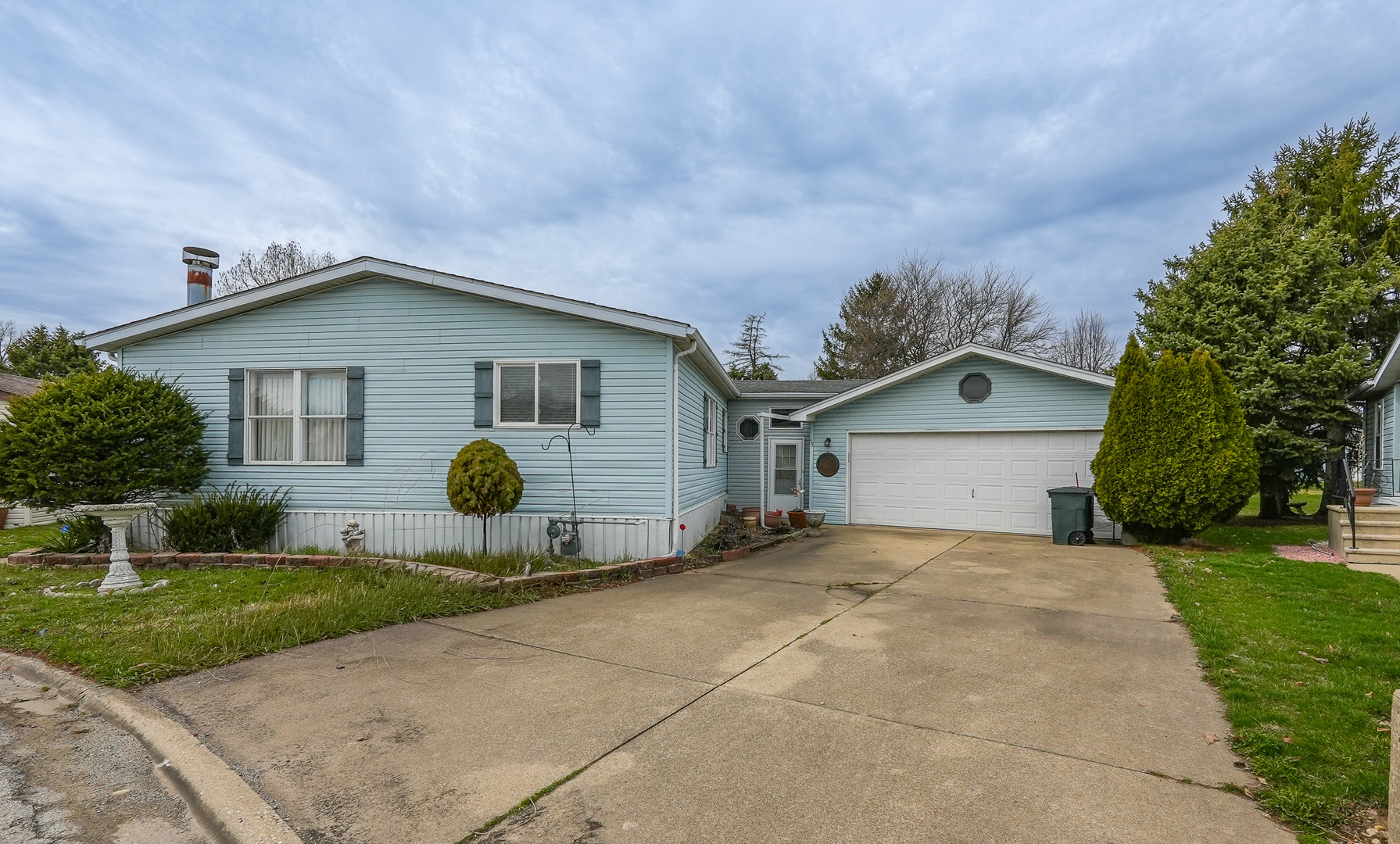 59 Maple Lane Manteno, IL 60950 - Photo 26 of 26 a front view of a house with yard and green space