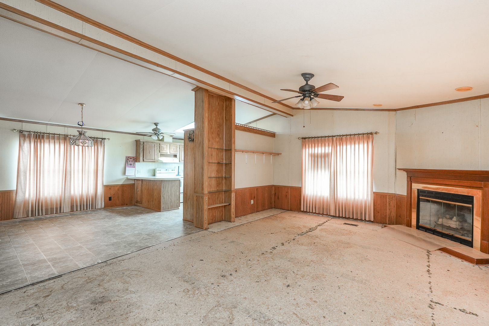 59 Maple Lane Manteno, IL 60950 - Photo 9 of 26 a large bedroom with a bed and a fireplace