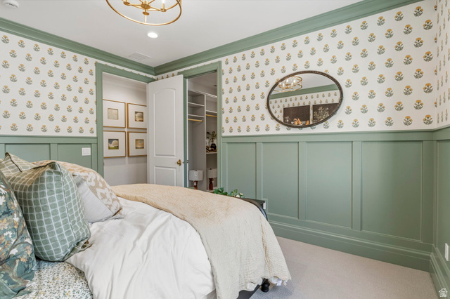 115 East Hidden Ridge Lane, Unit 42 Mapleton, UT 84664 - Photo 53 of 103 Bedroom featuring light green wainscoting and floral wallpaper