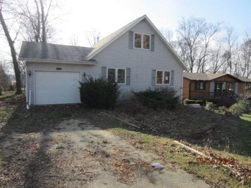 909 Lake Summerset Road Davis, IL 61019 - Photo 1 of 8 a view of a house with a yard