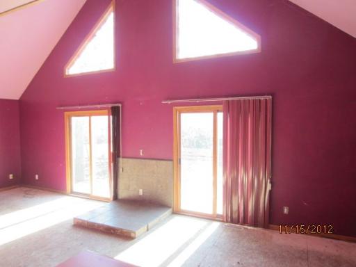 909 Lake Summerset Road Davis, IL 61019 - Photo 7 of 8 a view of an empty room with a window