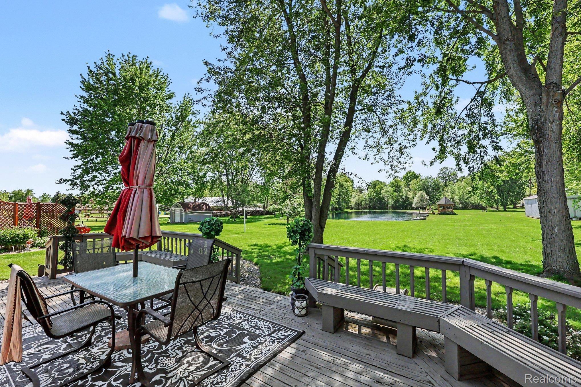 7020 Meldrum Road Fair Haven, MI 48023 - Photo 28 of 43 Spacious wood deck with built-in bench seating