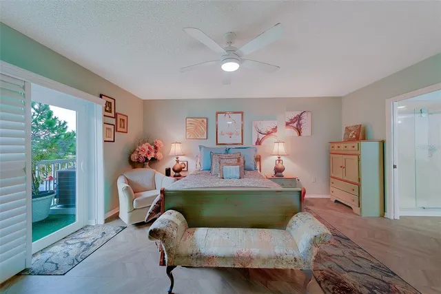 a bathroom with a granite countertop double vanity sink and mirror