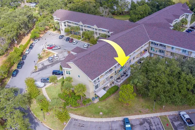 a car parked in front of a brick house
