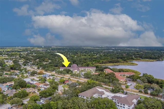 a view of a cars parked in front of a building