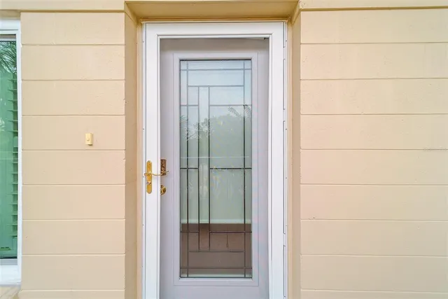 a living room with fireplace furniture and a wooden floor