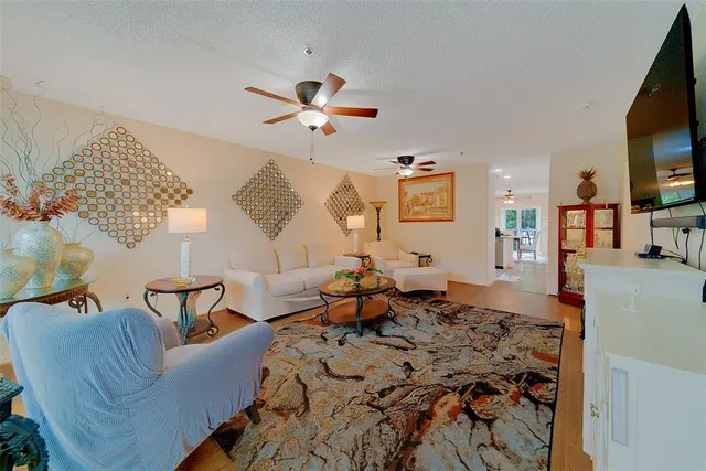 a view of a living room and dining room