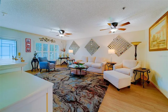 a kitchen with a sink cabinets and window
