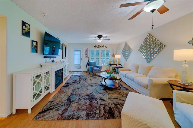 a kitchen with granite countertop stainless steel appliances and wooden cabinets
