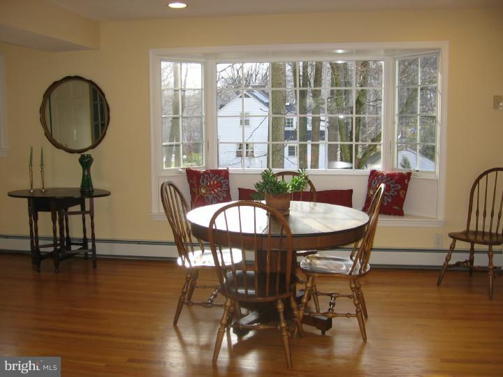 204 Beatty Road Media, PA 19063 - Photo 7 of 19 a view of a dining room with furniture window and wooden floor