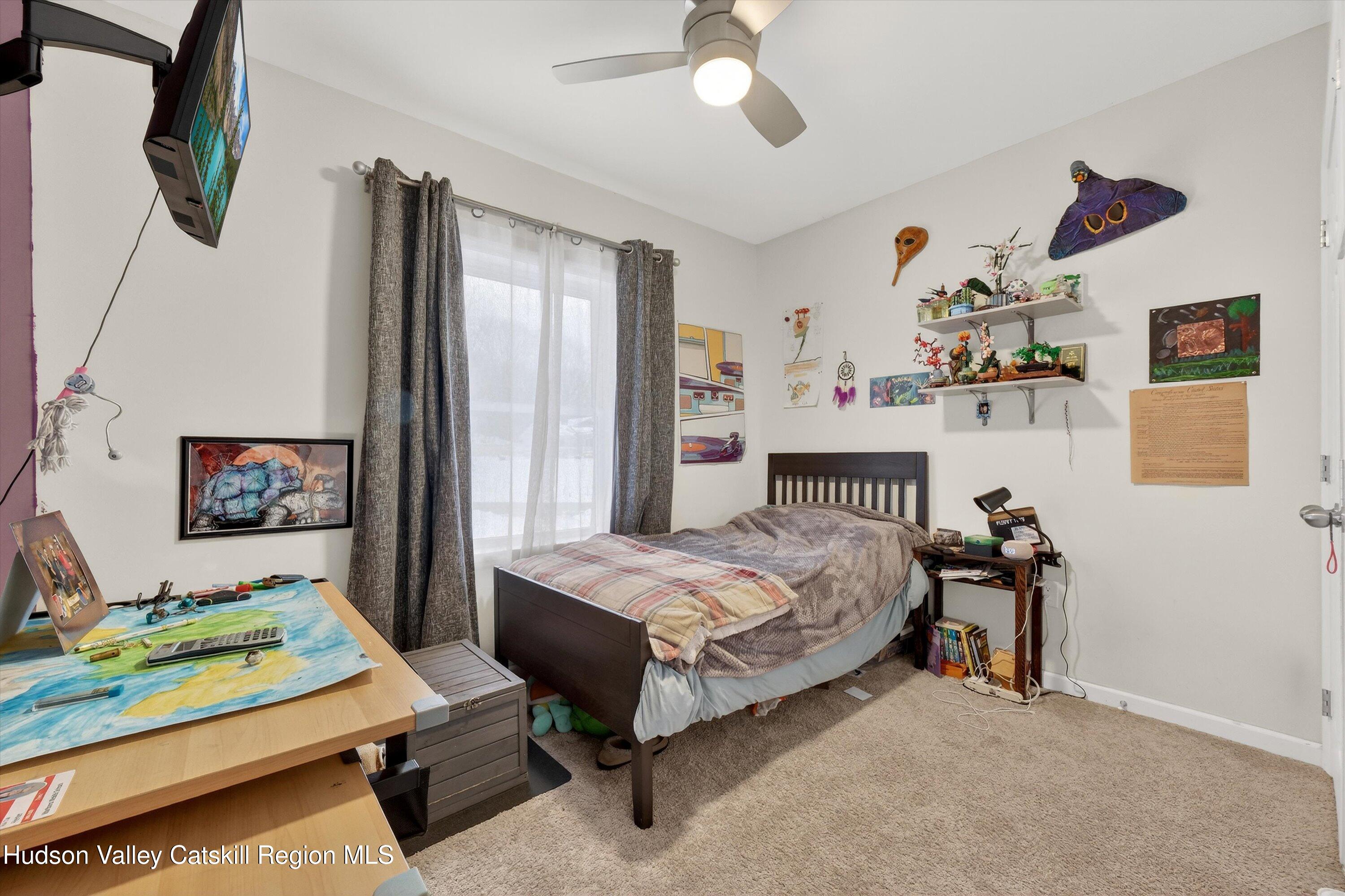 5 3rd Street Milton, NY 12547 - Photo 17 of 31 a bedroom with bed and a window
