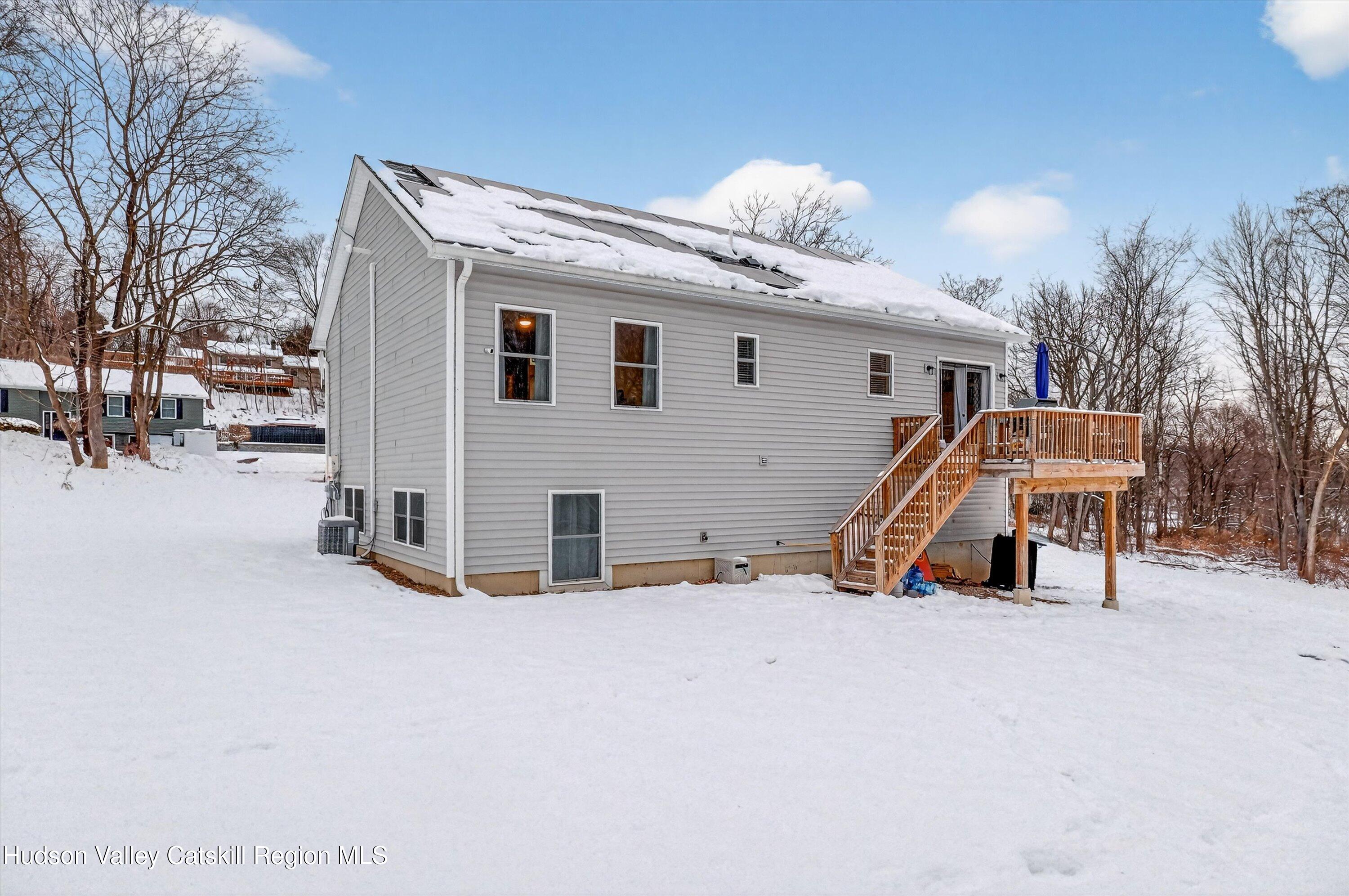 5 3rd Street Milton, NY 12547 - Photo 27 of 31 a view of a house with a patio and a yard
