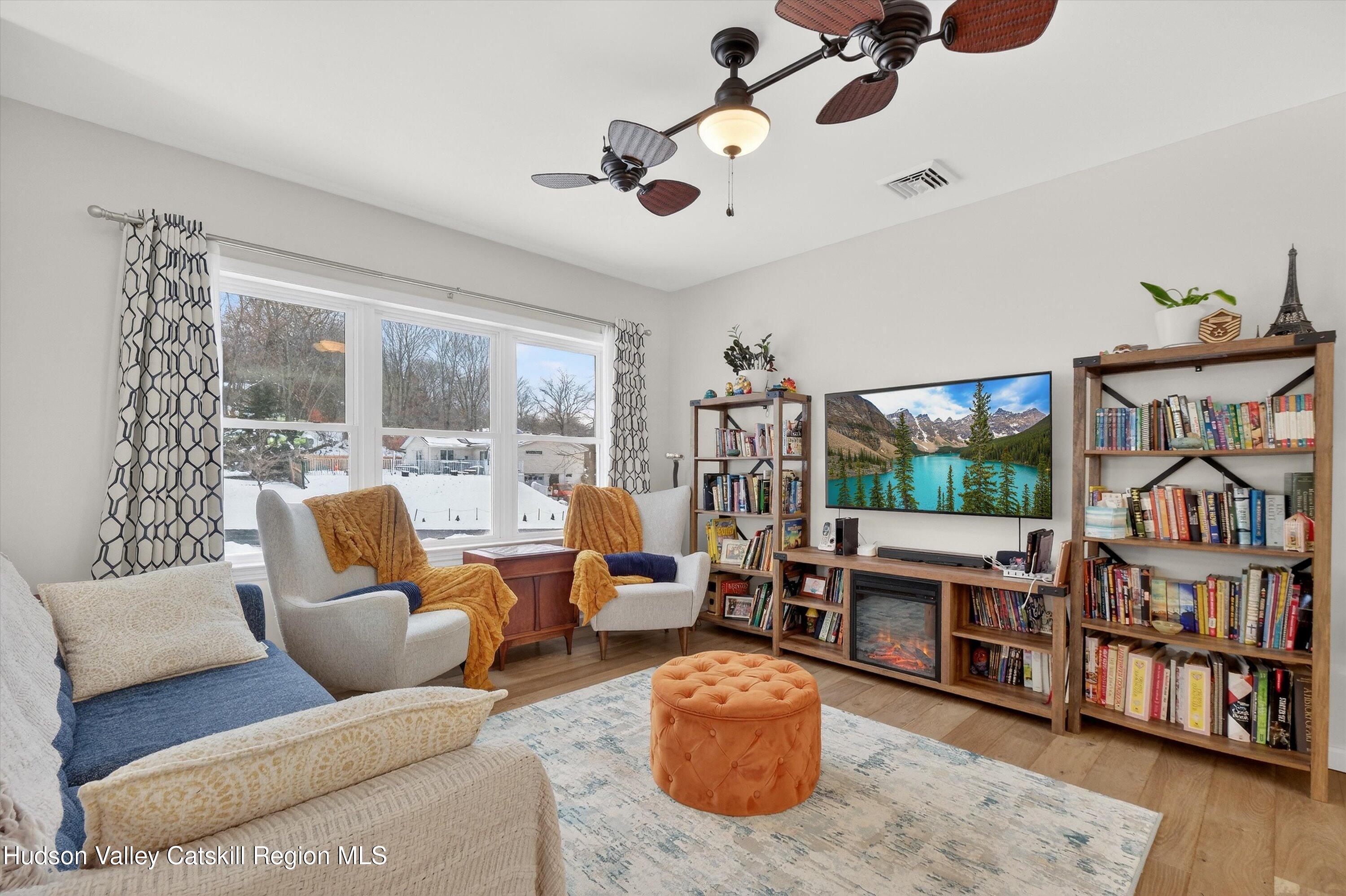 5 3rd Street Milton, NY 12547 - Photo 4 of 31 a living room with furniture and a large window