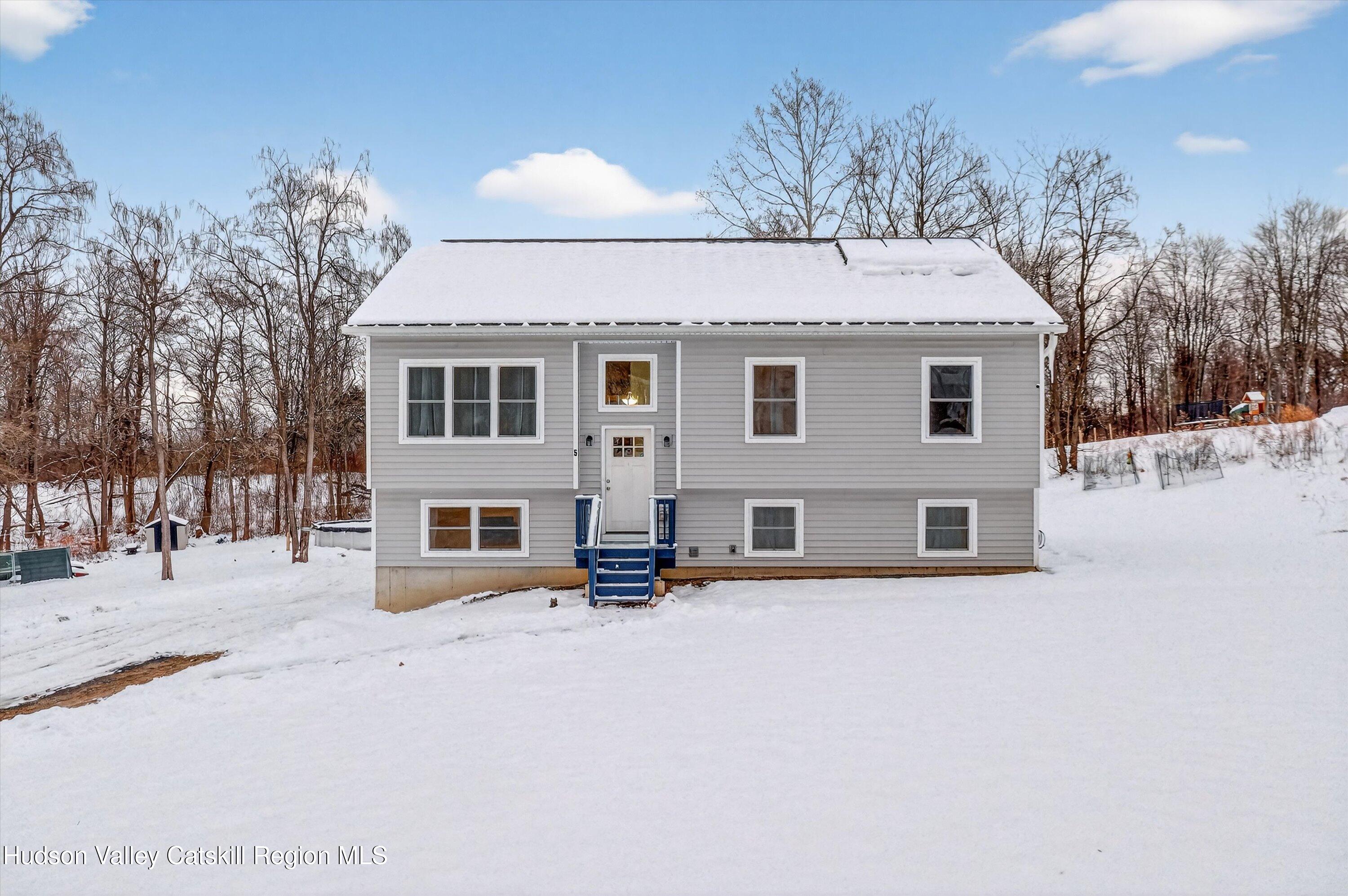 5 3rd Street Milton, NY 12547 - Photo 7 of 31 a view of a house with a snow in the yard