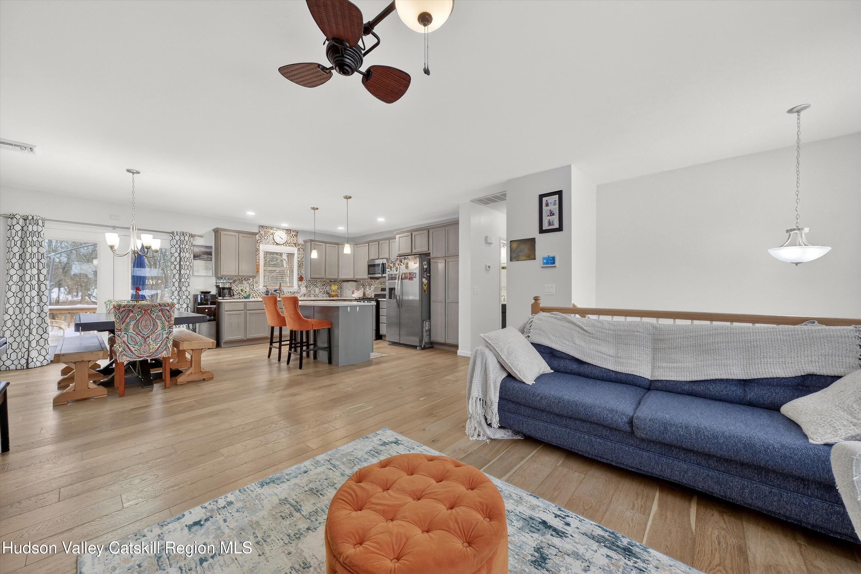 5 3rd Street Milton, NY 12547 - Photo 9 of 31 a living room with furniture and a dining table