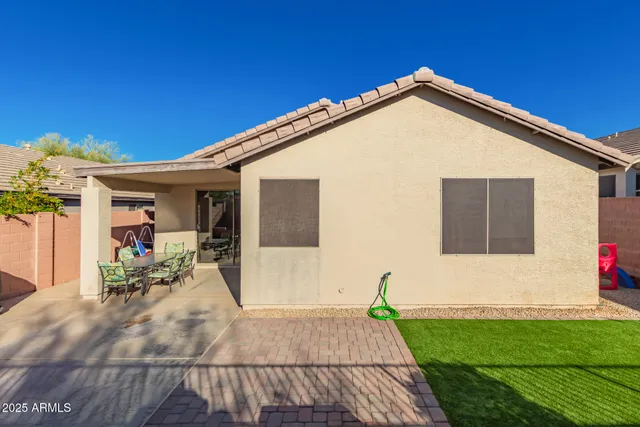 a view of a house with patio