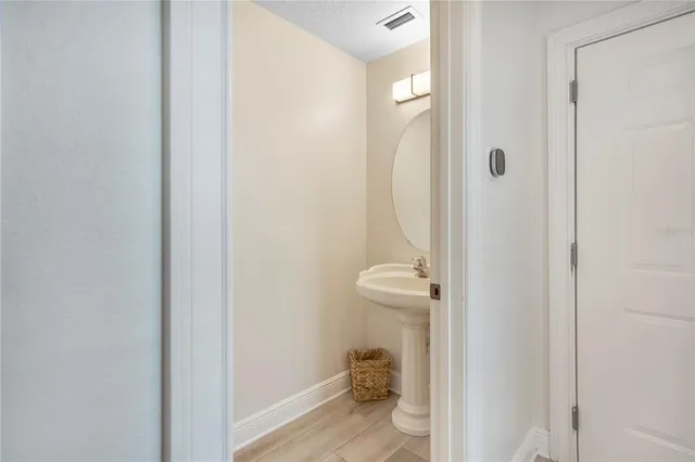 a bed room with a bed and a television