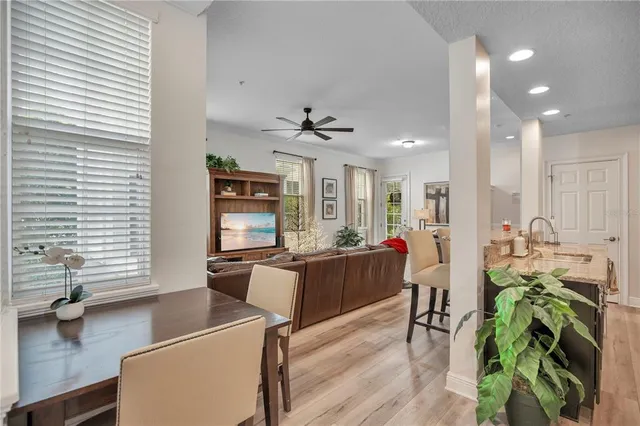 a view of a kitchen and dining room