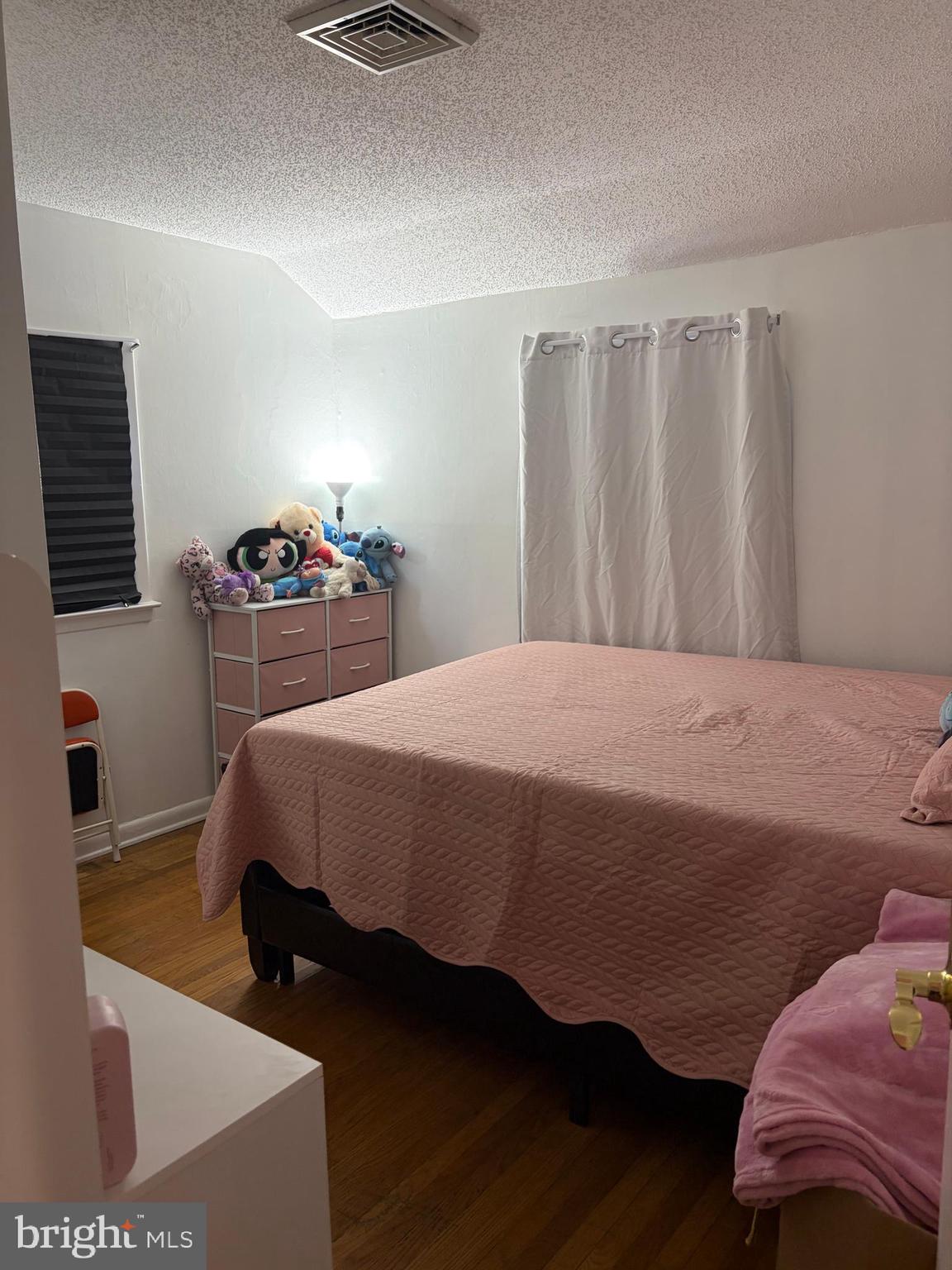 7404 Wyndam Road Pennsauken, NJ 08110 - Photo 28 of 50 a bedroom with a bed and a couch