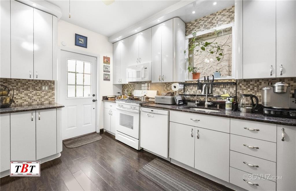 2515 Avenue R Brooklyn, NY 11229 - Photo 15 of 30 a kitchen with granite countertop white cabinets and white appliances