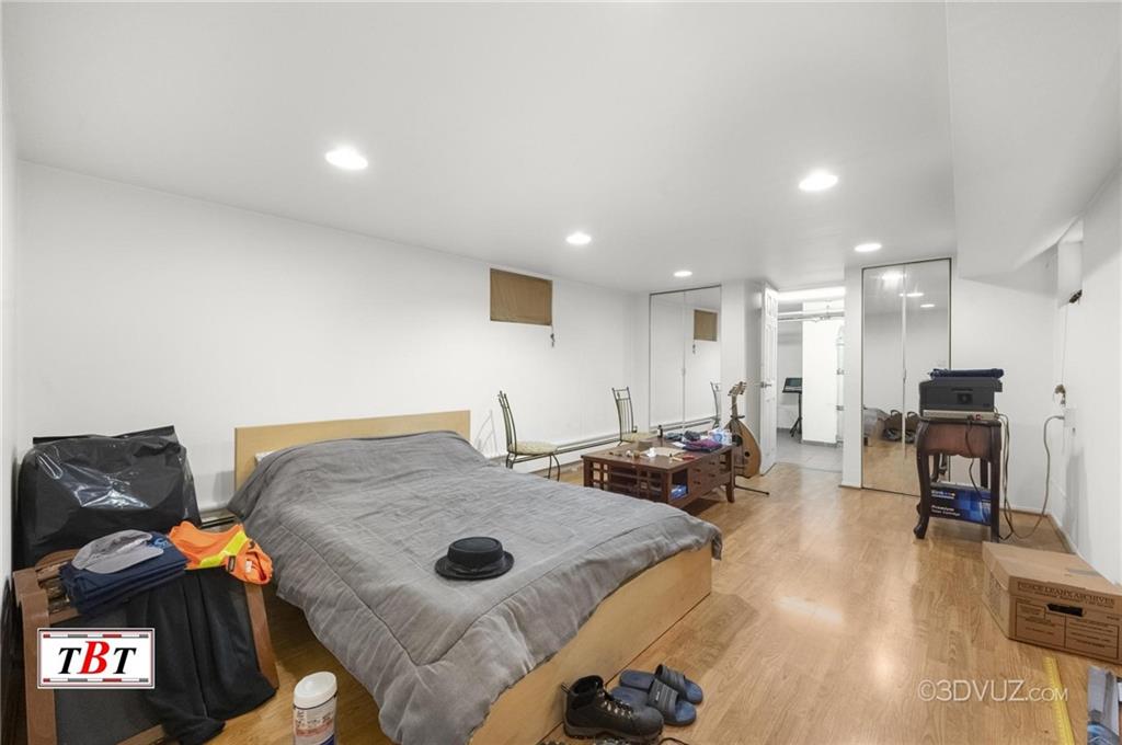 2515 Avenue R Brooklyn, NY 11229 - Photo 24 of 30 a living room with furniture and a table