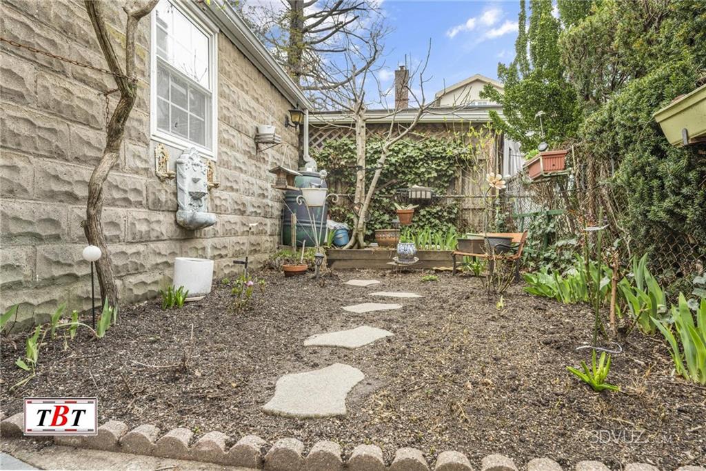 2515 Avenue R Brooklyn, NY 11229 - Photo 28 of 30 a view of a brick house with a yard