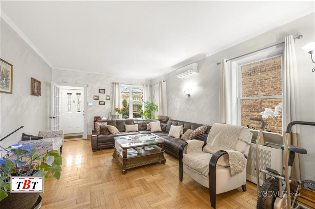 2515 Avenue R Brooklyn, NY 11229 - Photo 7 of 30 a living room with furniture and a large window