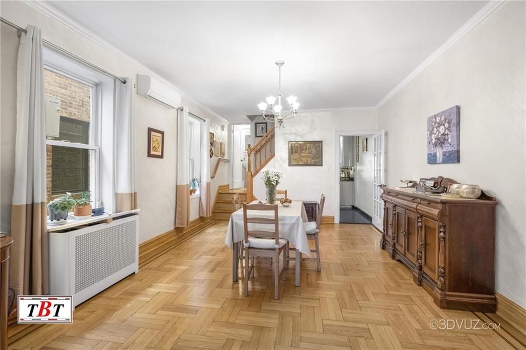 2515 Avenue R Brooklyn, NY 11229 - Photo 9 of 30 a large living room with stainless steel appliances kitchen island granite countertop furniture and a chandelier
