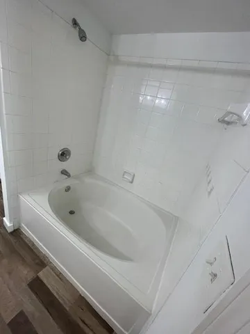 a bathroom with a bathtub