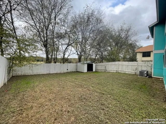 a house with trees in front of it