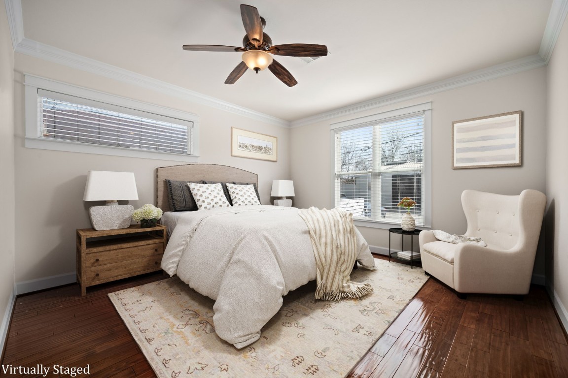 110 Kendall Street Houston, TX 77003 - Photo 12 of 36 a bedroom with a large bed couch and a window