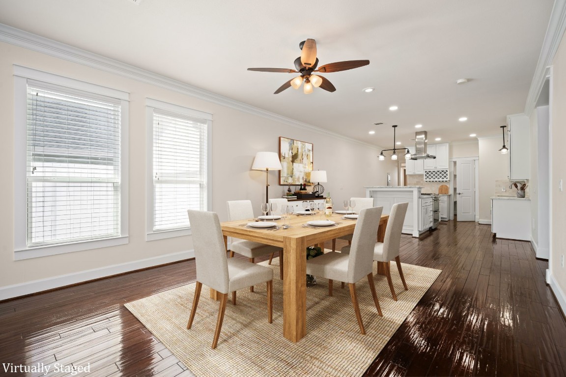 110 Kendall Street Houston, TX 77003 - Photo 7 of 36 a view of a dining room with furniture window and wooden floor