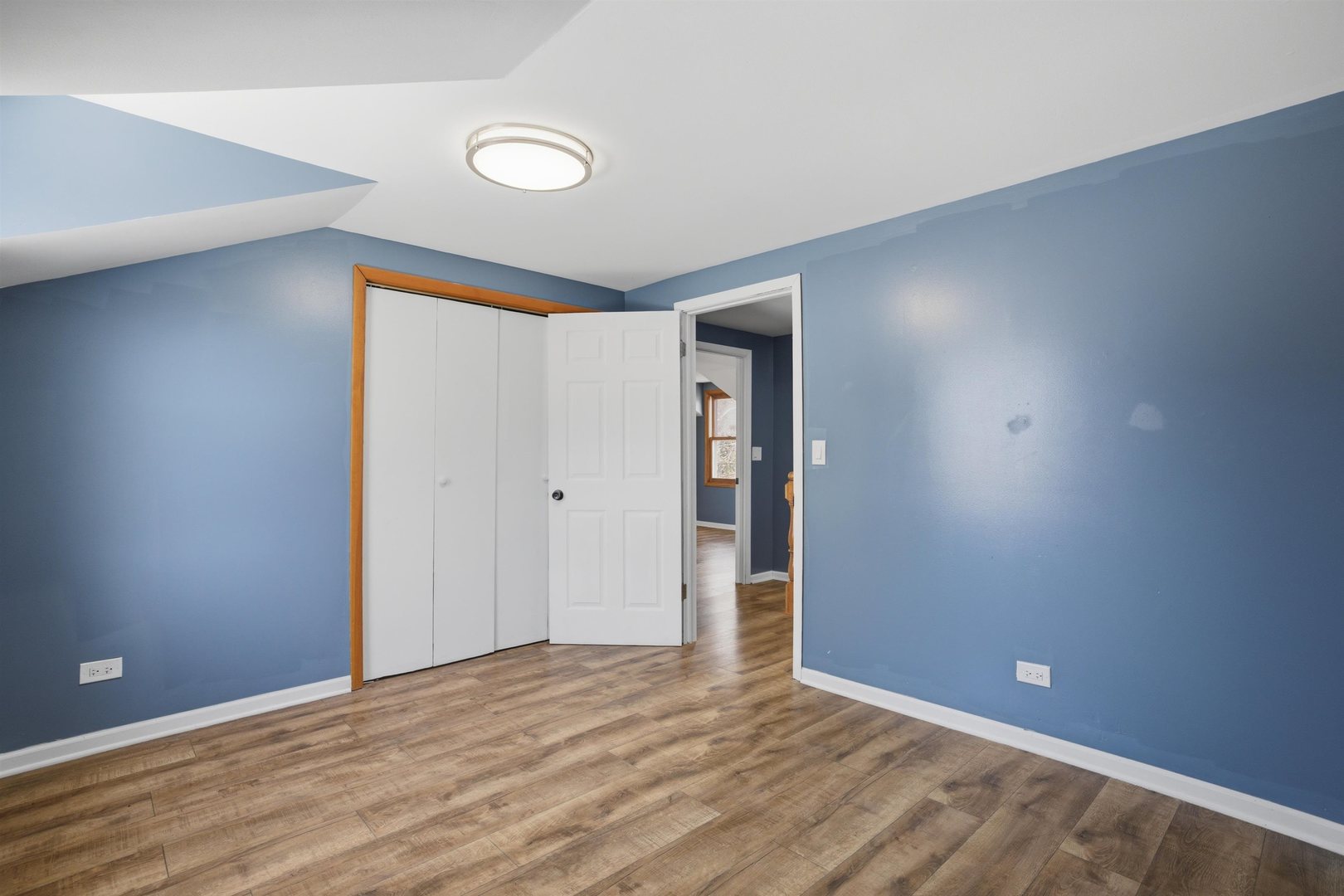 17N620 Ketchum Road Hampshire, IL 60140 - Photo 28 of 50 a view of an empty room with wooden floor and closet