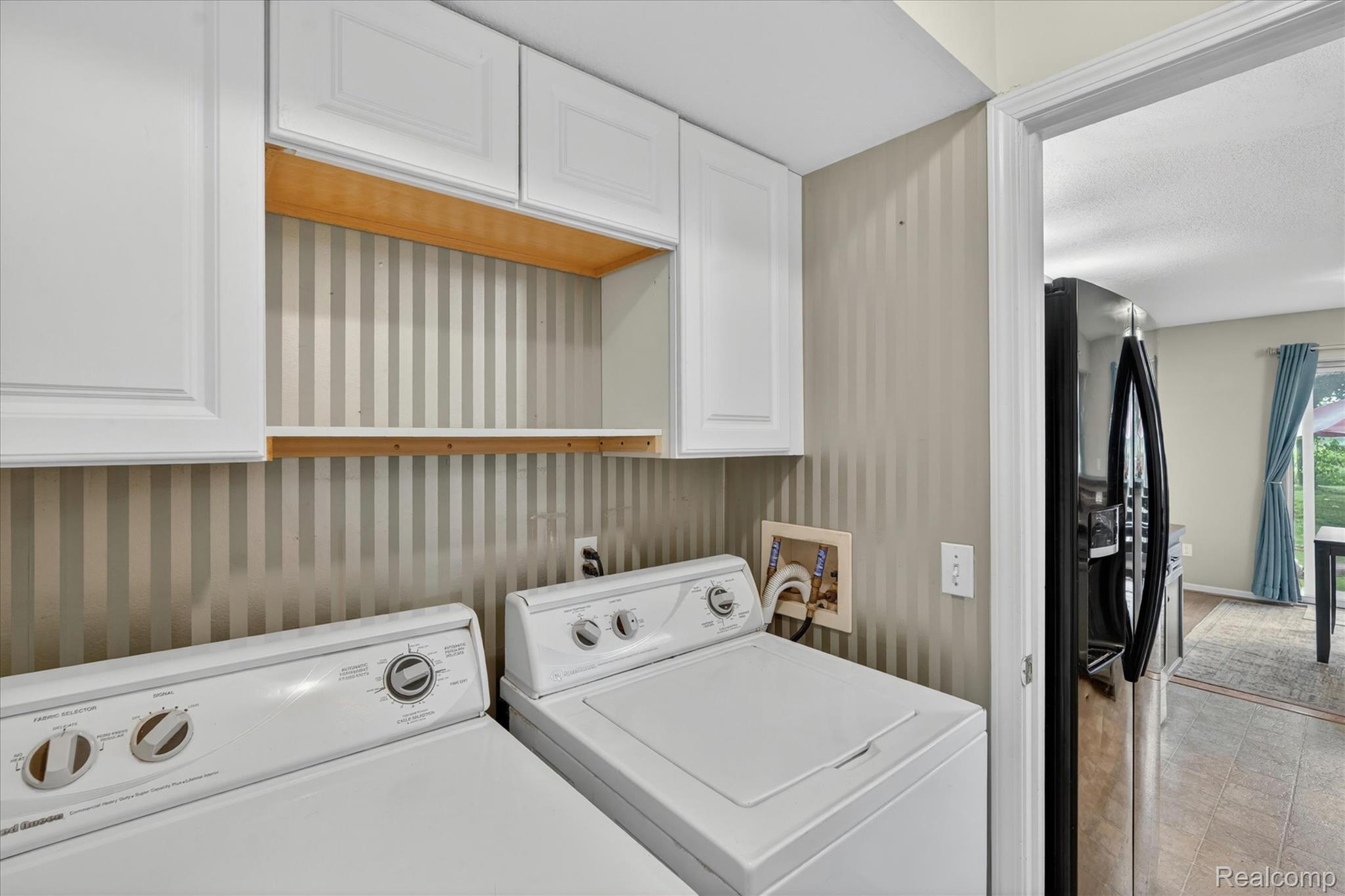 456 Lilly View Court Howell, MI 48843 - Photo 14 of 45 Laundry room