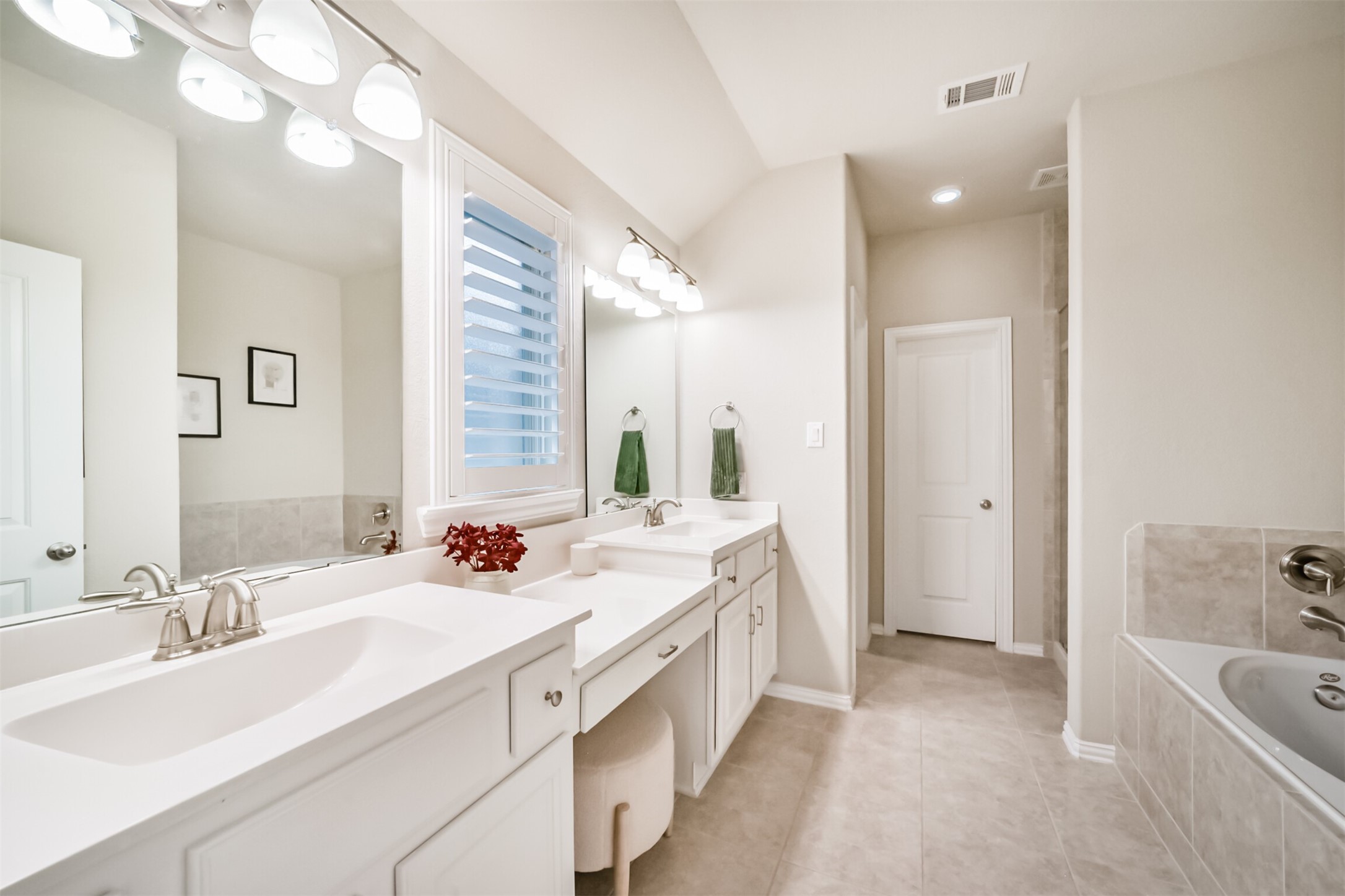 2309 Redwood Ridge Trail Manvel, TX 77578 - Photo 14 of 26 Primary bathroom with double sinks, vanity and separate garden tub and shower