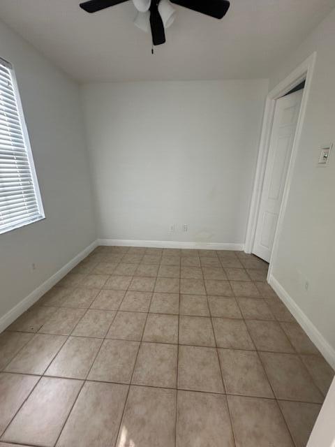 2502 North Dixie Highway, Unit 49 Lake Worth, FL 33460 - Photo 11 of 12 a view of an empty room and window