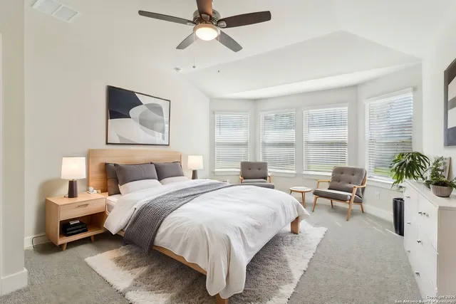 a bathroom with a sink double vanity and a mirror
