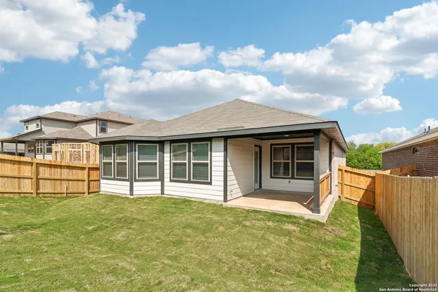 a view of a house with a garden