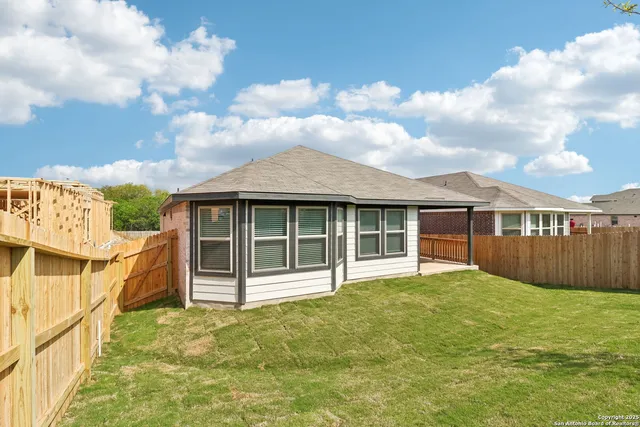 a picture of a room with a bench in it