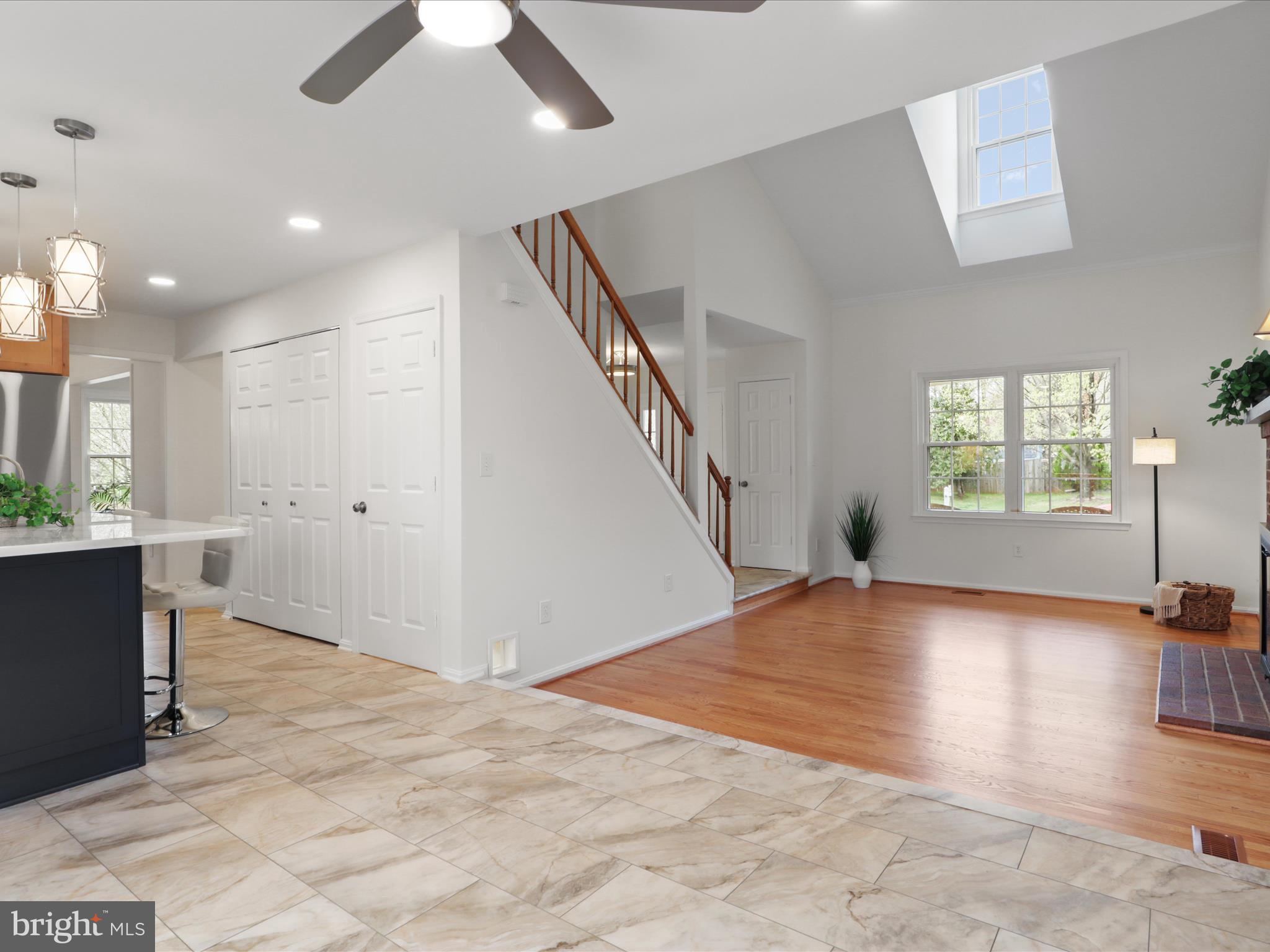332 Silver Ridge Drive Sterling, VA 20164 - Photo 12 of 53 a view of an empty room with wooden floor and a window